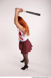 TINA STANDING POSE WITH BASEBALL BAT